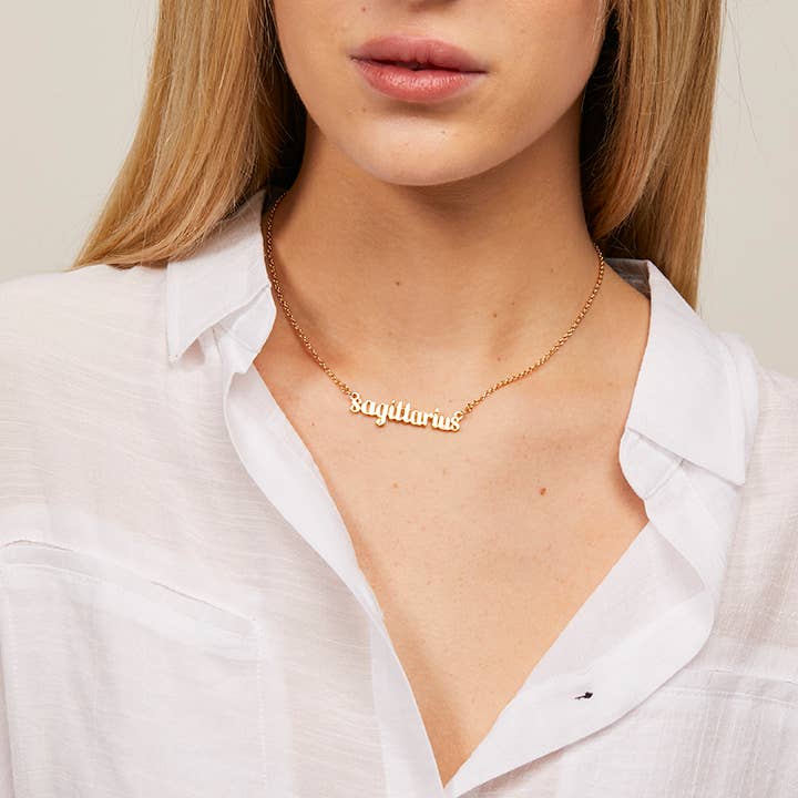 Gold Zodiac Sagittarius Script Necklace | Horoscope Accessories for wholesale on Faire3