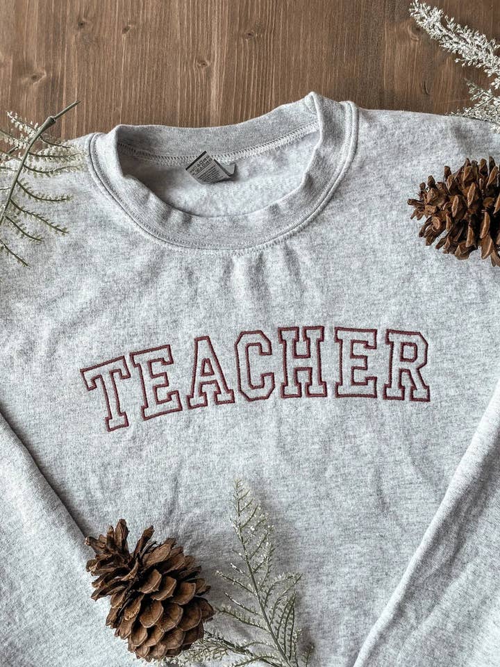 Teacher Outline Crewneck | Embroidered Apparel Crewneck for wholesale by Kewteepie