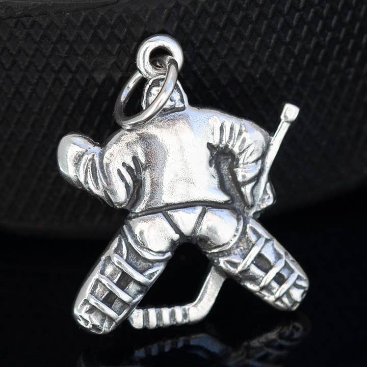 Sterling silver hockey goalie pendant (ponytail option) for wholesale by Sambora Jewelry