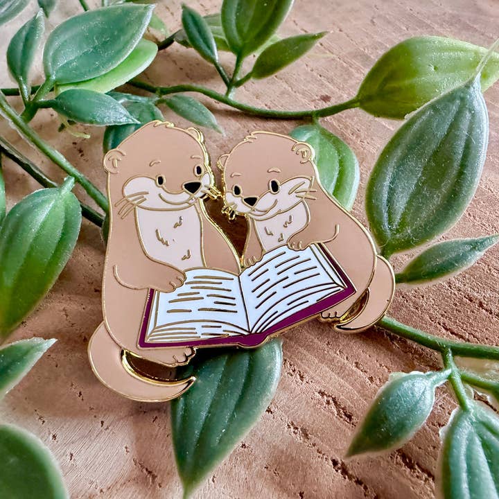 Reading Otters Enamel Pin for wholesale by Magic&Books