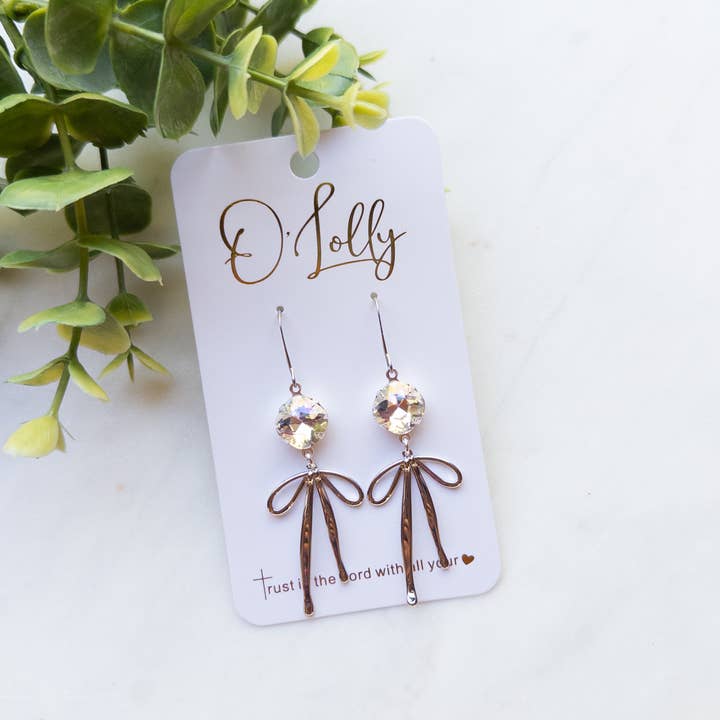 O’Lolly Jewelry - Wholesale Dangle Earrings - "Blakely"- Clear 10mm Stone w/Gold Bow Dangle Earrings