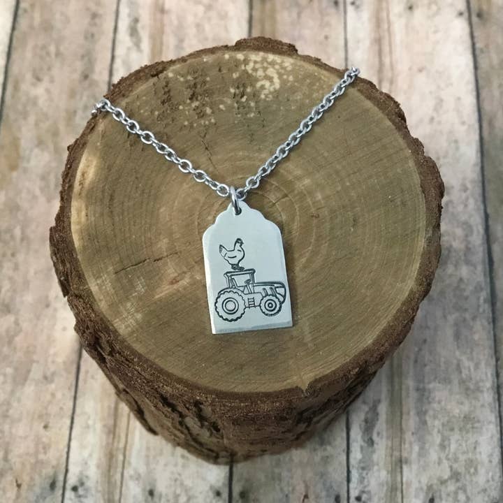 Chicken riding tractor, cattle ear tag style pendant for wholesale by Jamie Haley Designs