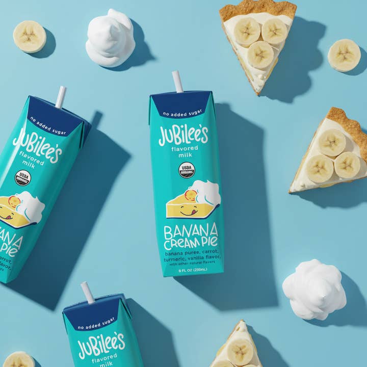 Boîtes de Super Lait Stable à la Crème de Banane, pack de 12 pour la vente par Jubilee's Super Milk
