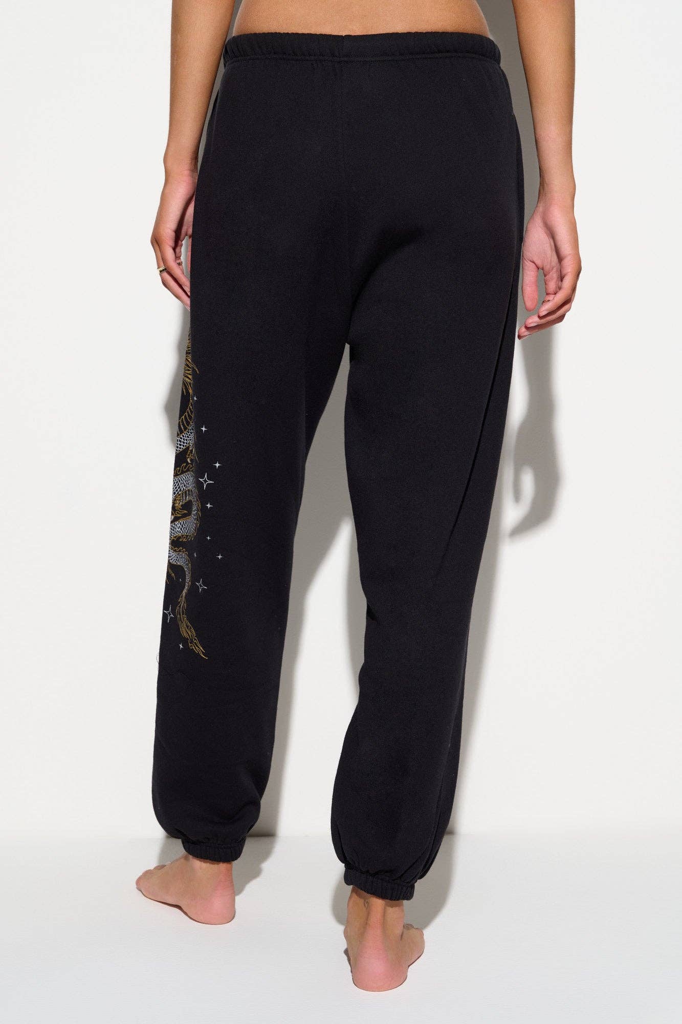 BLACK Warrior Spirit Sol Sweatpant for wholesale on Faire1