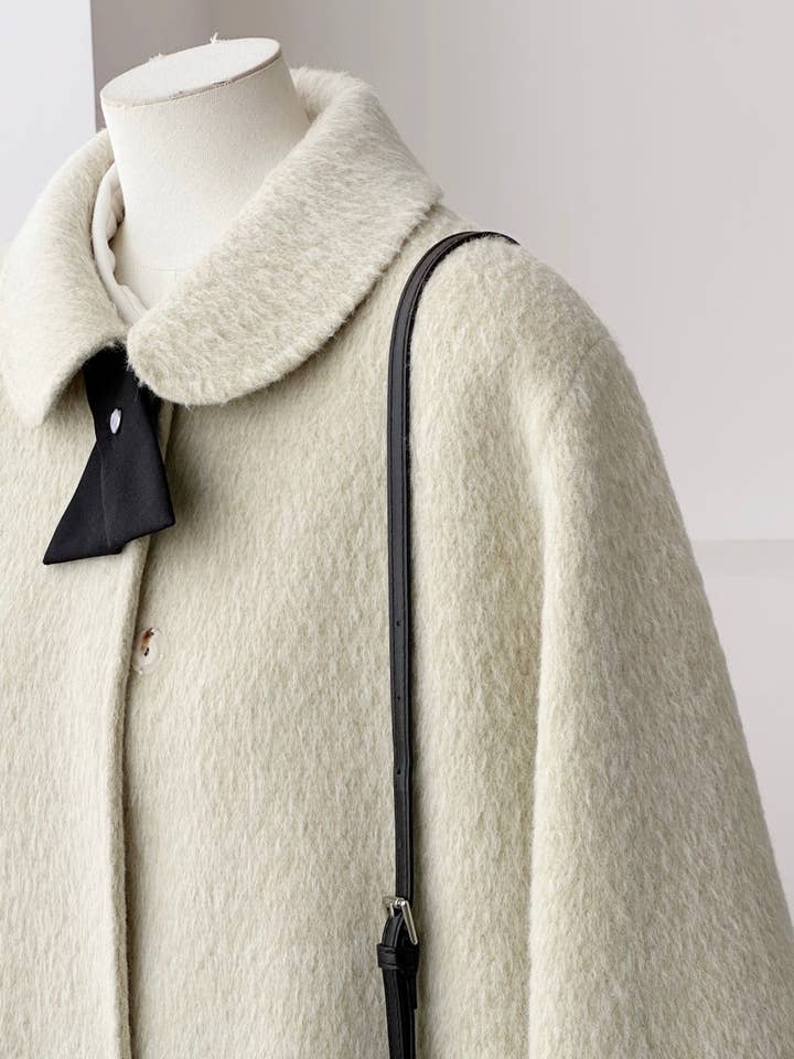 Velora Sleeveless Suri Wool Cape for wholesale by Loom & Line