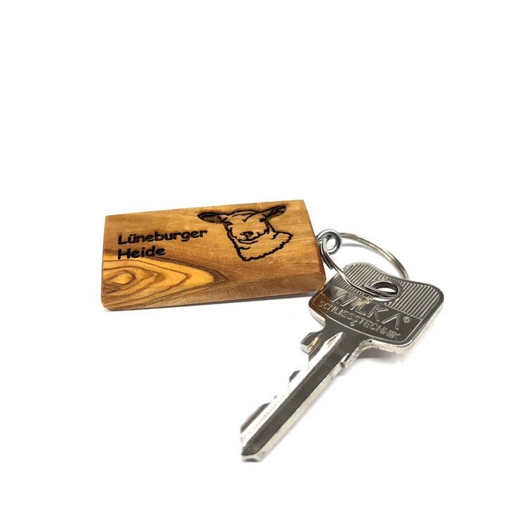 Olive Wood Keychain SAM and other Purchase Wholesale engraved keychains. Free Returns & Net 60 Terms on Faire trending on Faire.