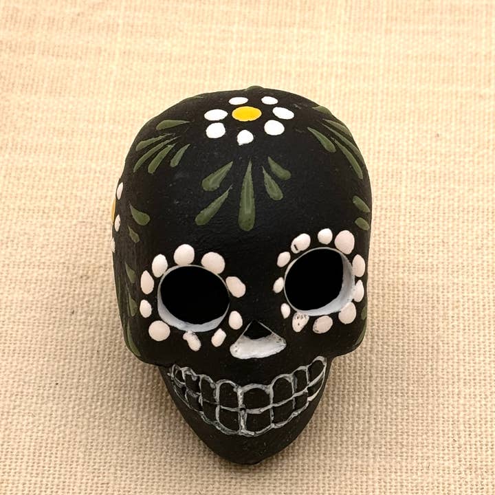 Black Floral Pottery Skull, Peru for wholesale by Tesoros Trading Company
