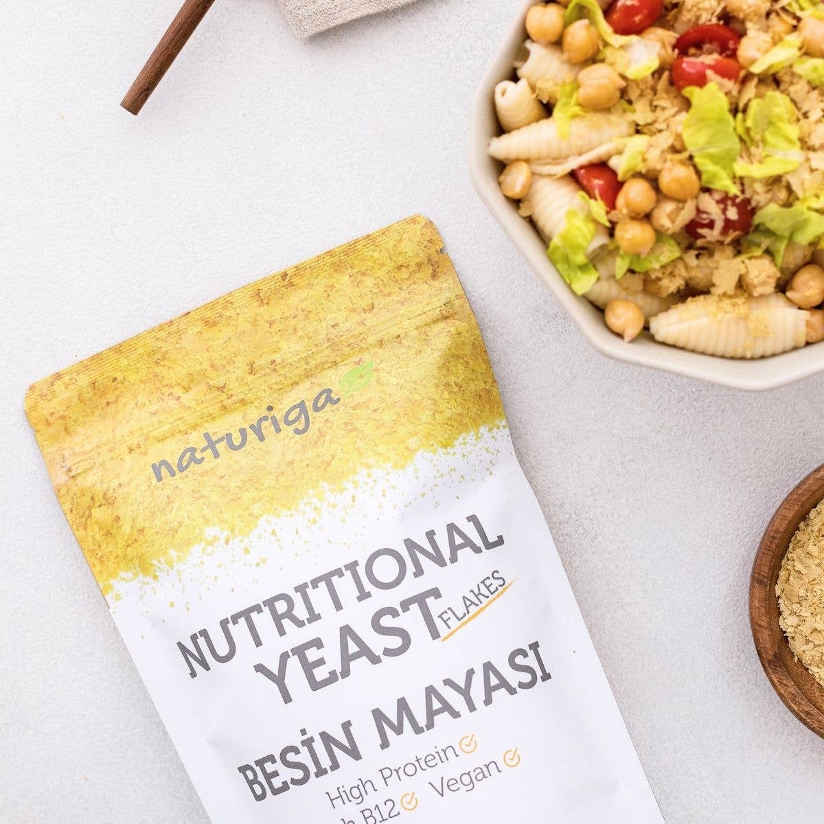 Multi Colored Naturiga Nutritional Yeast Flakes (100 Gr) for wholesale on Faire1