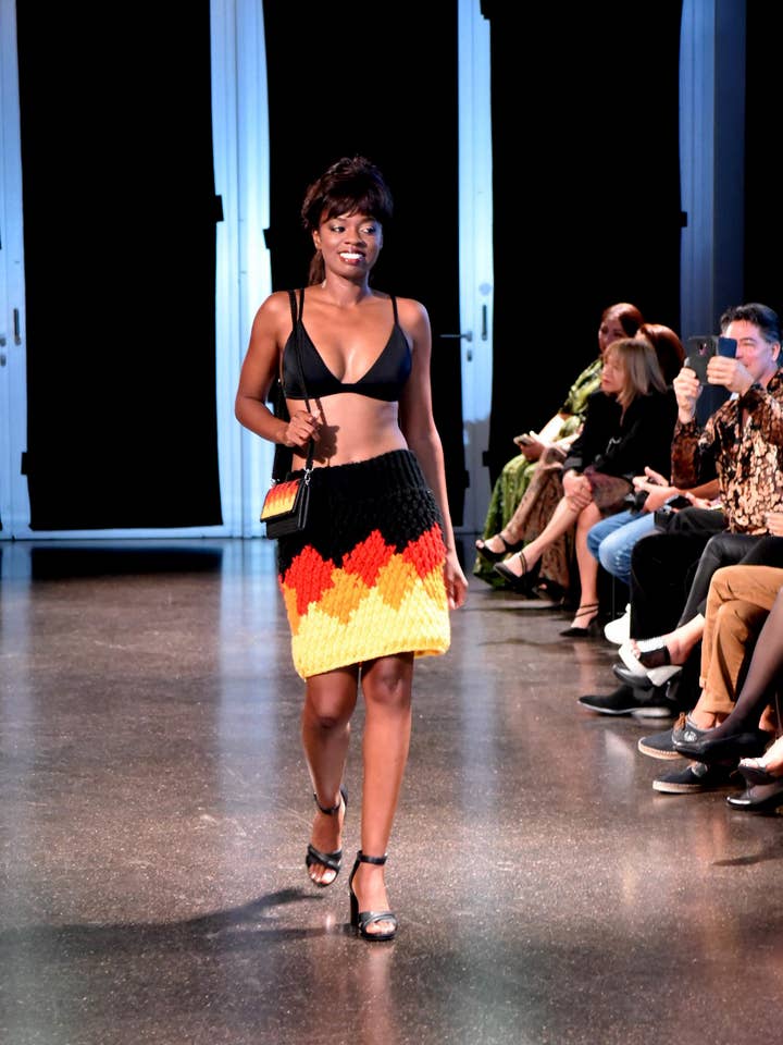 Crochet black/red/yellow skirt with matching handbag for wholesale by Komang Darmiani