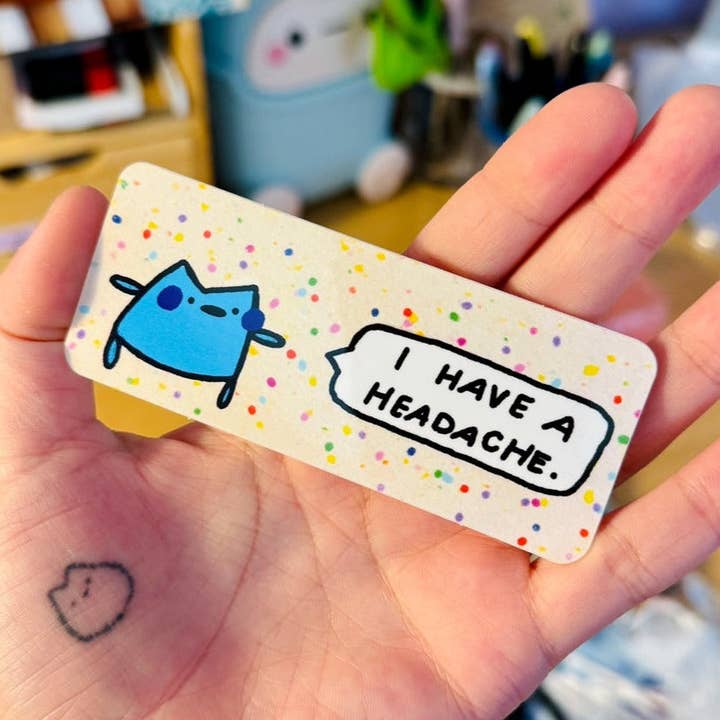 i have a headache sticker : ( for wholesale by Stay Okay Studio