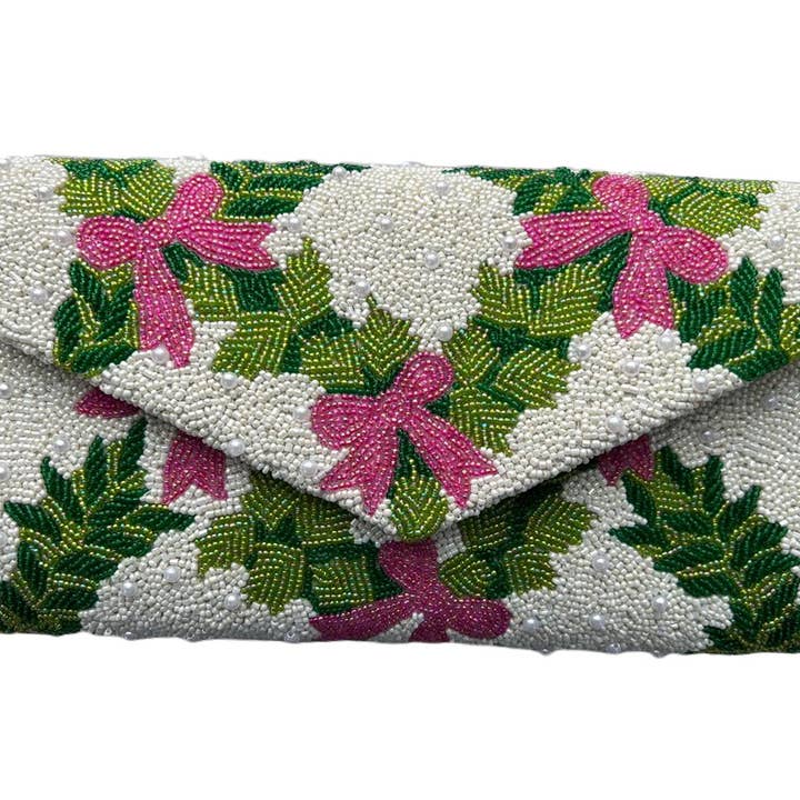 Rosa rosetter elfenbensgrön kuvertväska ENV 437 - Elfenben / Smaragd / lime - Rosetter i hetrosa för wholesale av Tiana Designs