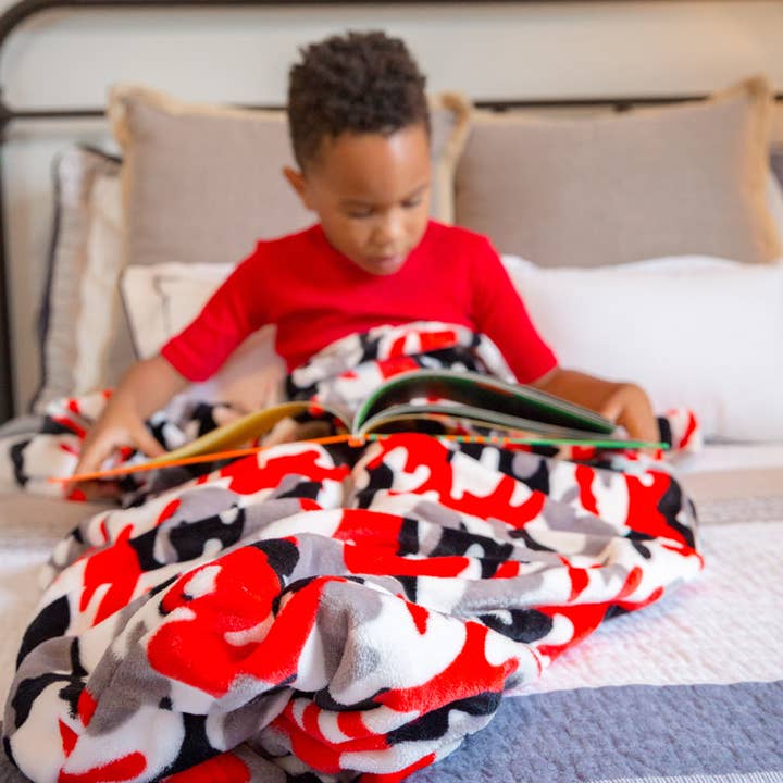Kids Blanket With a Foot Pocket in Cool Camo for wholesale by PediPocket: The Foot Pocket Blanket