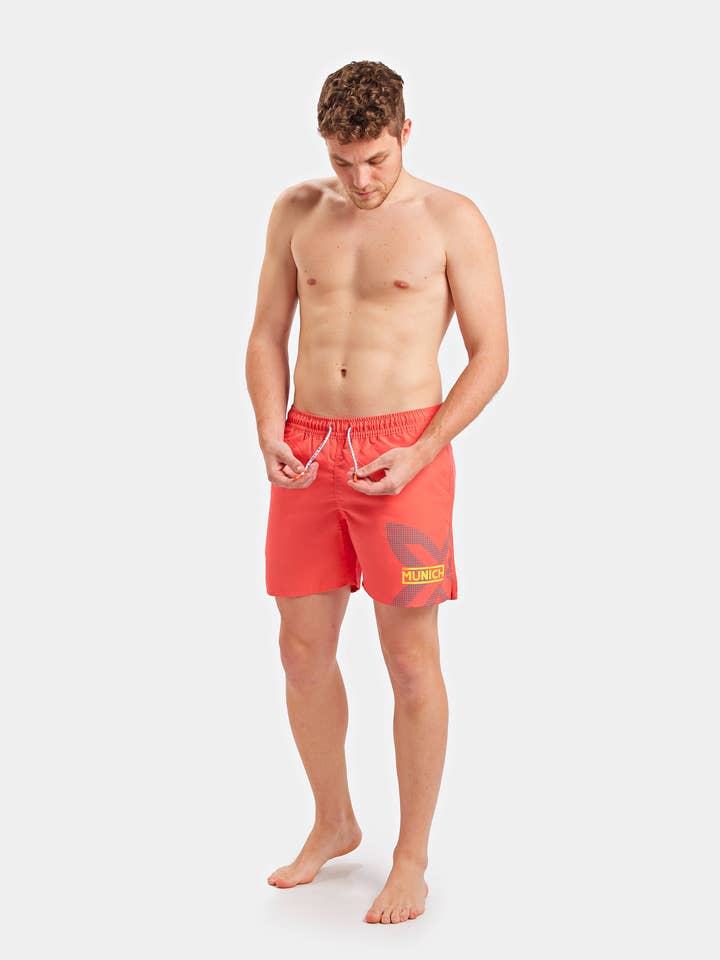 Maillot de bain long pour homme couleur corail, avec poches pour la vente par Munich
