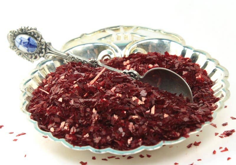 Cristales rojos Brillo de cristal alemán con cristales rojos, purpurina real Super Shard de venta al por mayor en Faire2