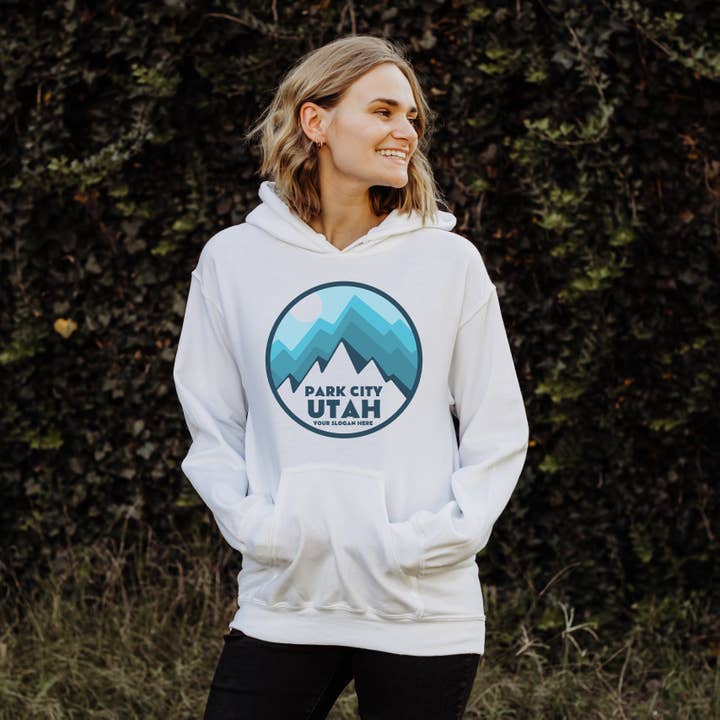 SUDADERA CON CAPUCHA BLUE MOUNTAINS PERSONALIZABLE | TALLAS S-2XL para venta al por mayor de Loopty Loo Designs