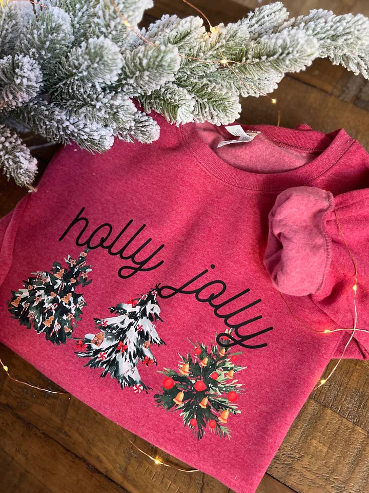 “Holly Jolly” Graphic for wholesale by Sweet Rae’s Clothing Co.