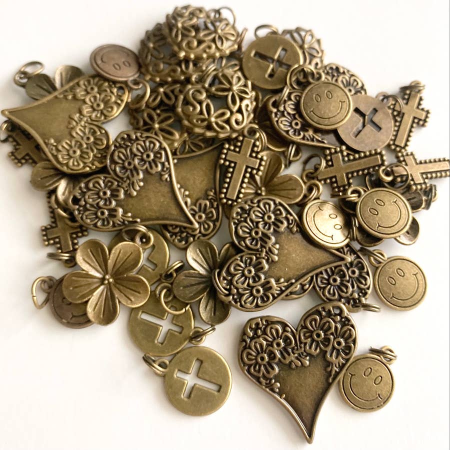 Purchase Wholesale charms for permanent jewelry. Free Returns & Net 60  Terms on Faire