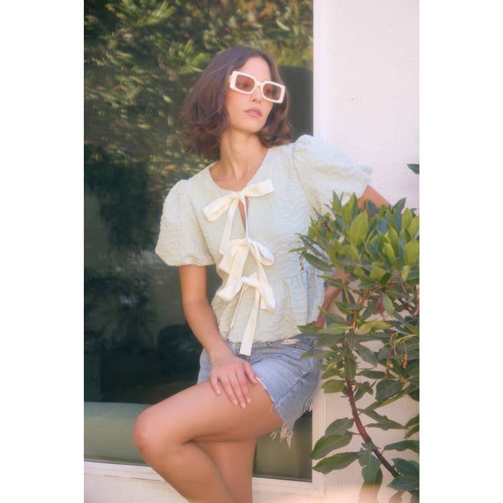 idem ditto - Wholesale Blouse - Women's - BUBBLE PEPLUM TOP WITH TEXTURED FABRIC AND BOW