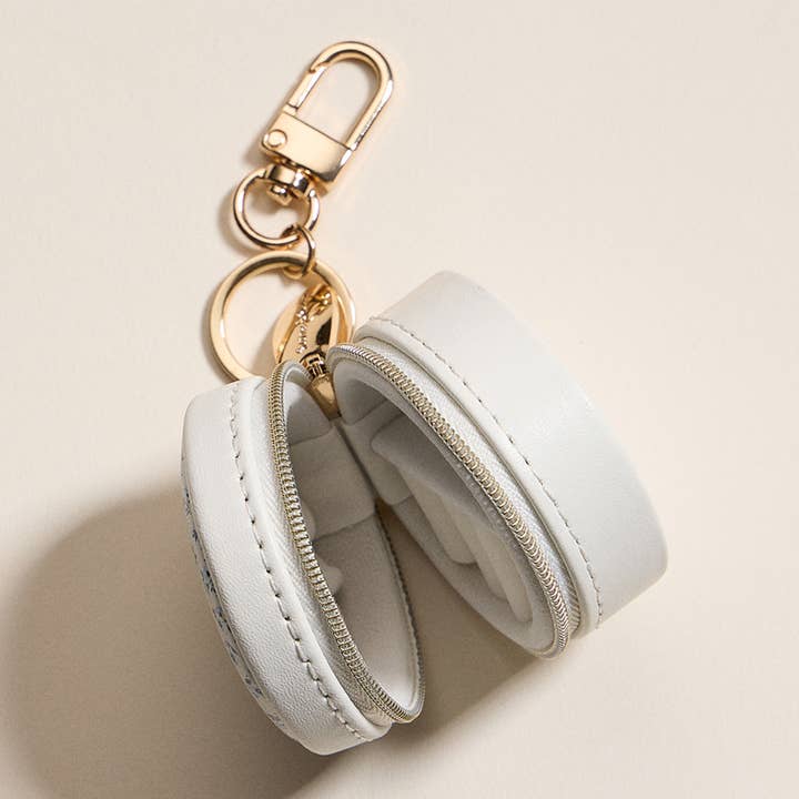 Sensibling Corp. - Wholesale Jewelry Box/Organizer - Floral Pattern Printed Round Shaped Travel Jewelry Case Keychain / Bag Charm2