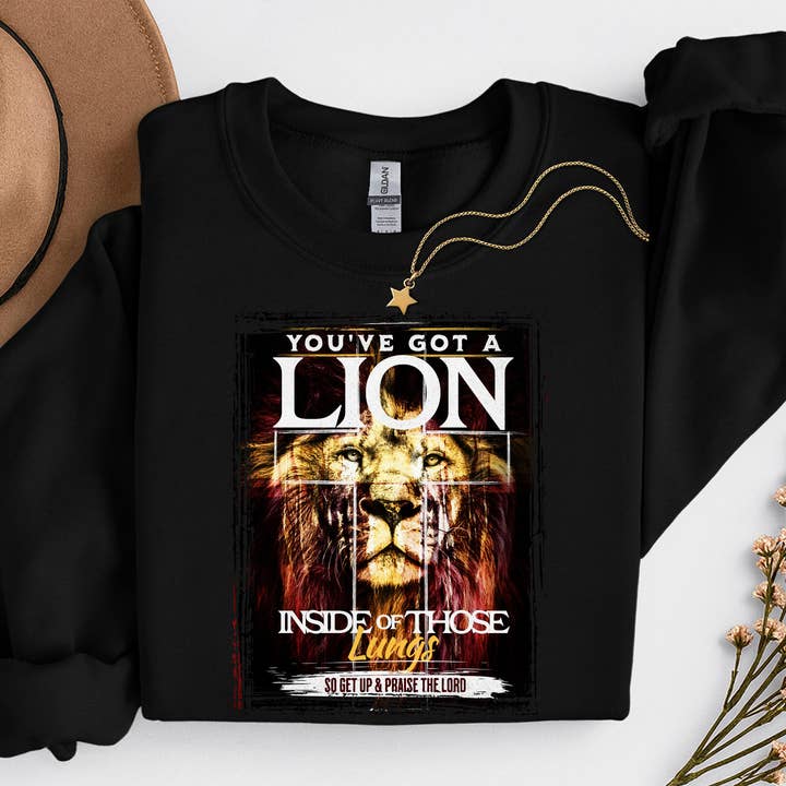 Lion Inside Those Lungs Christian Graphic Tee or Sweater for wholesale by Sam & Seb Co.