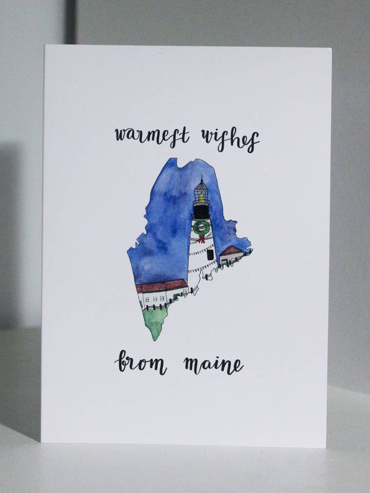 Warmste wensen Maine Lighthouse | Nautische kerstkaart voor wholesale door Scribbles and Doodlez