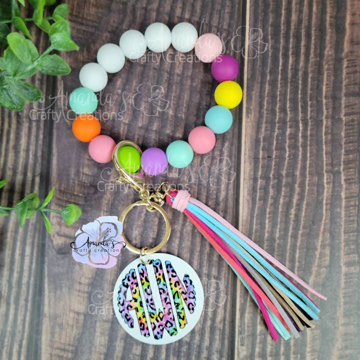 ACC Sublimation Blanks - Venta al por mayor Pulseras llavero - Llavero con cuentas de silicona, pulsera arcoíris, láser, inglés
