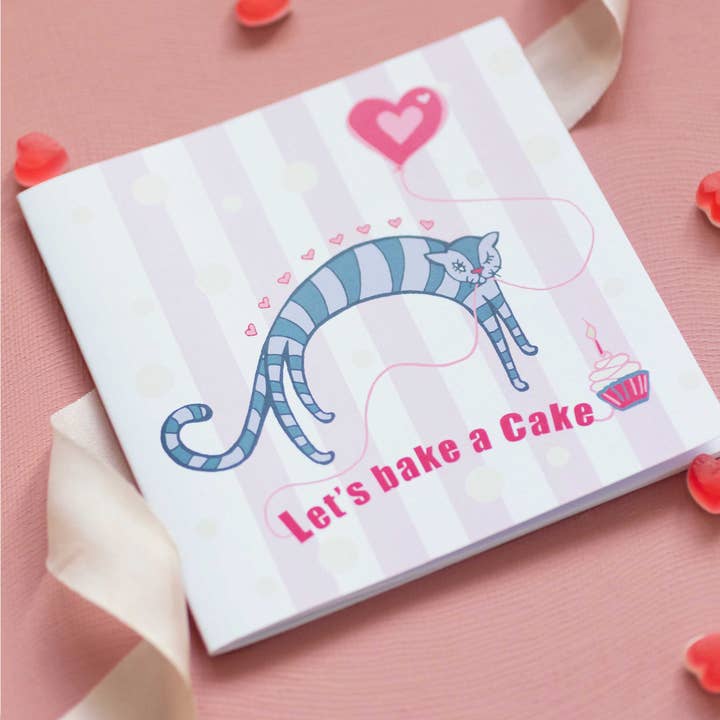 Piccolo taccuino bianco con motivo Let's Bake a Cake a Cake, motivo: gattino e palloncini per la vendita all'ingrosso da parte di Starshine Design by Julie Harris
