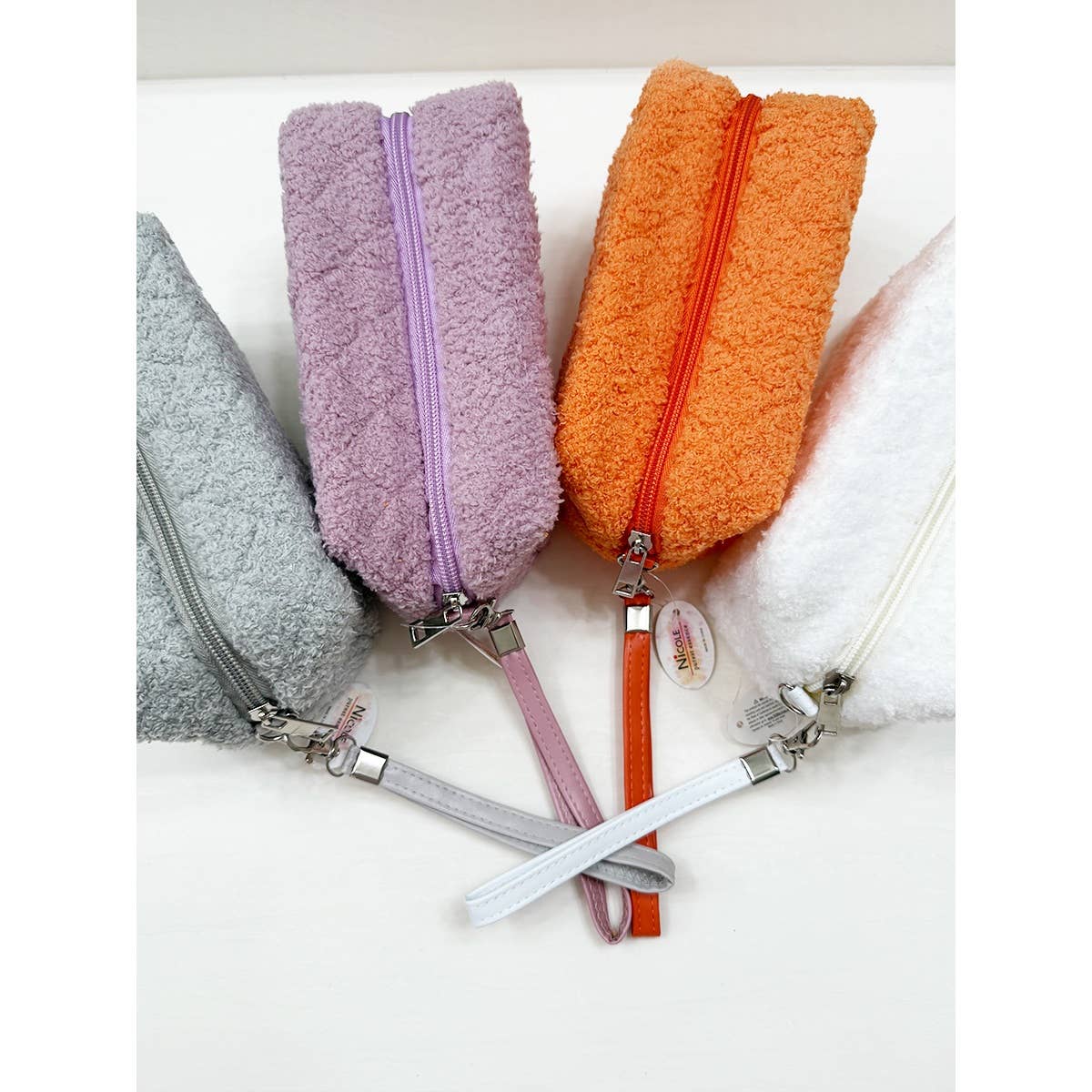 MIX COLOR Soft Plushie Teddy Cloth Light Weight Cosmetic Bag for wholesale on Faire9