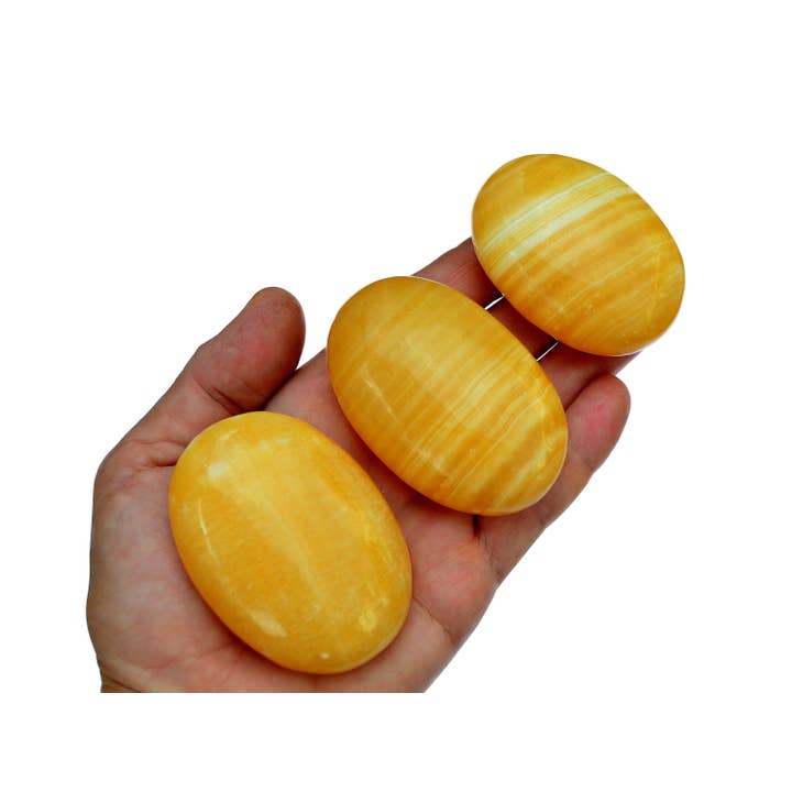 Kaia & Crystals – Engroshandel Spirituelle sten og krystaller – Orange calcit håndsten 1 kg (8-10 stk) - (50 mm - 70 mm)1