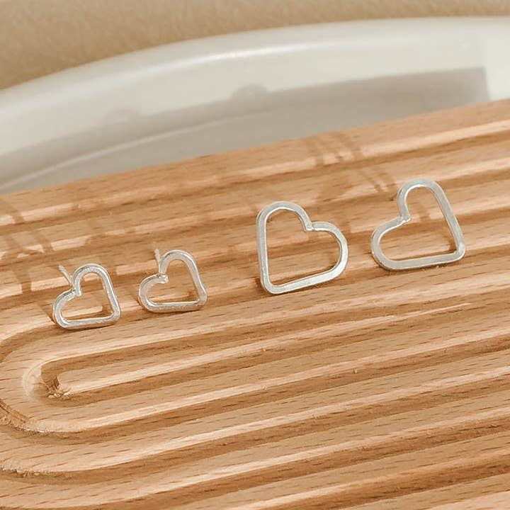 Handmade Heart Stud Earrings in Sterling Silver – Dainty & Romantic Everyday Jewelry by LoveGem Studio for wholesale by LoveGem Studio LLC