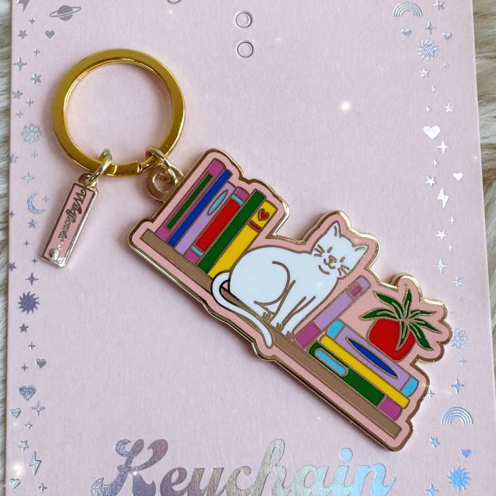 Cat Bookshelf Enamel Keychain for wholesale by Wildflower + Co.