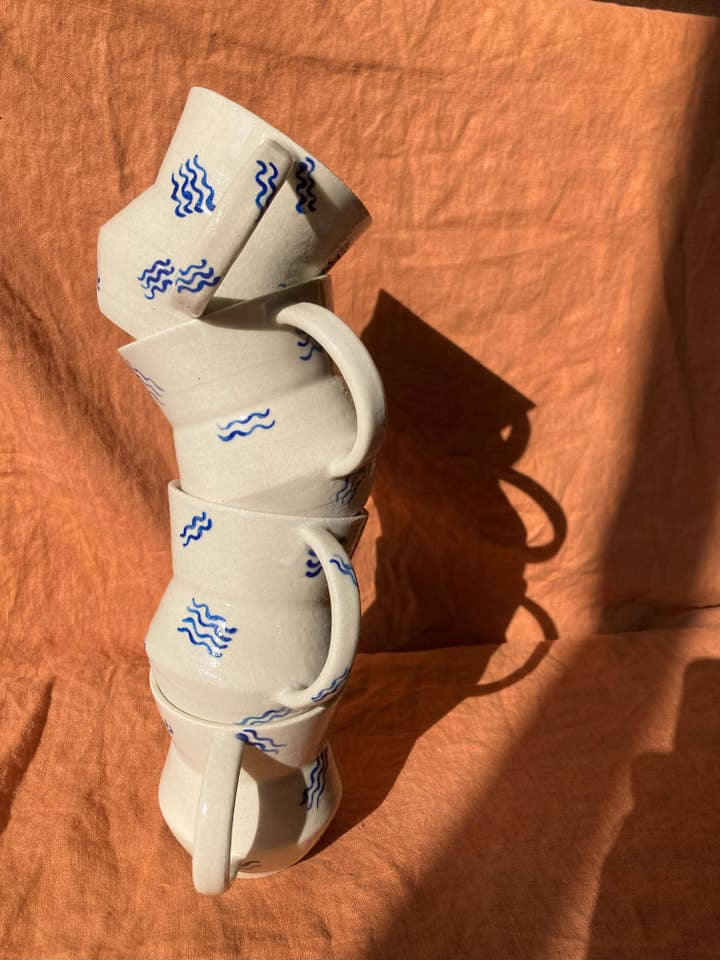 Angled Wavy Mug for wholesale by Dancing Dunes Ceramics