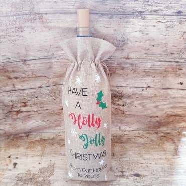 HAVE A HOLLY JOLLY CHRISTMAS - BURLAP BOTTLE GIFT BAG for wholesale by HEATHER'S HOME