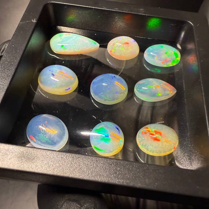 Welo Opal Cabochons – 9 pcs Jewelry-Grade Parcel (40.25 CT) for wholesale by Modeeq Gems