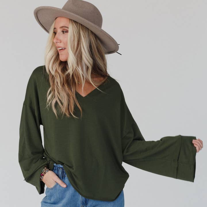 Love It V Neckline Sweater Top - Olive and other Purchase Wholesale olives online. Free Returns & Net 60 Terms on Faire trending on Faire.