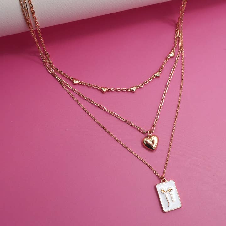 GOLD SQUARE BOW EPOXY CHARM LAYERED NECKLACE | 80N91936 for wholesale on Faire2