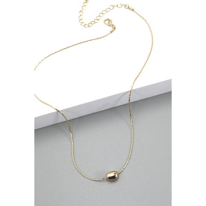 GOLD BRASS DIAMOND CUT CHAIN BEAN CHARM NECKLACE | 31N23238 for wholesale on Faire