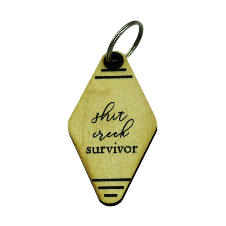 Funny Keychains - Shit Creek Survivor for wholesale by Driftless Studios