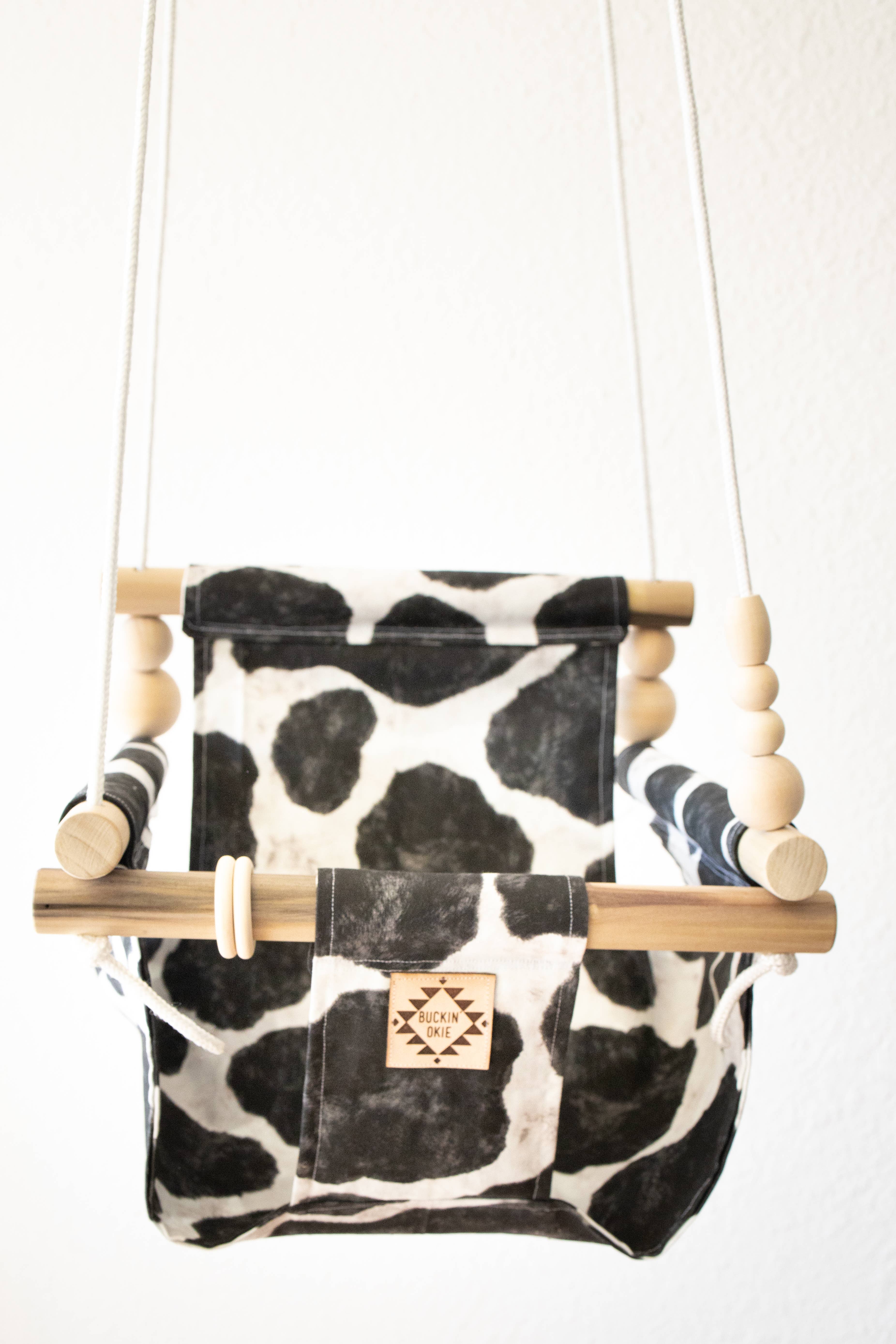 Buckin’ Okie Boutique - Wholesale Swing - Kids & Baby - Cow Baby/Toddler Swing1