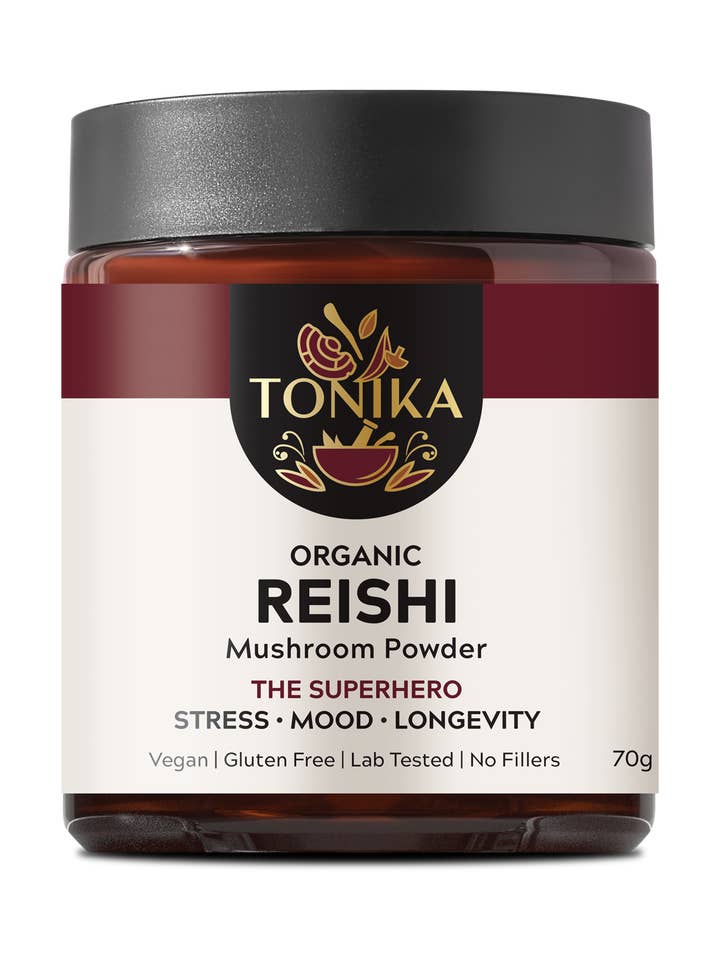 Glasgefäß mit Reishi-Pilzpulver aus biologischem Anbau - The Superhero für den Großhandel von Tonika