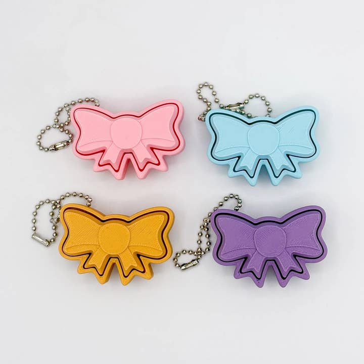 Cute Bow Fidget Clicker Keychain for wholesale by Prism3D Creations
