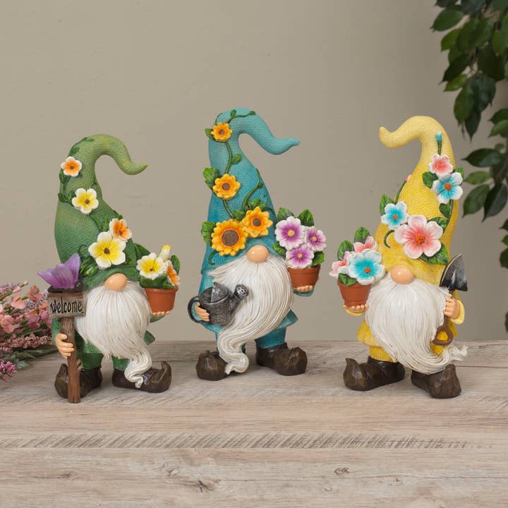 Gerson Our 9.6"H Resin Gnome Figurine with Flower, available for wholesale by The Gerson Companies