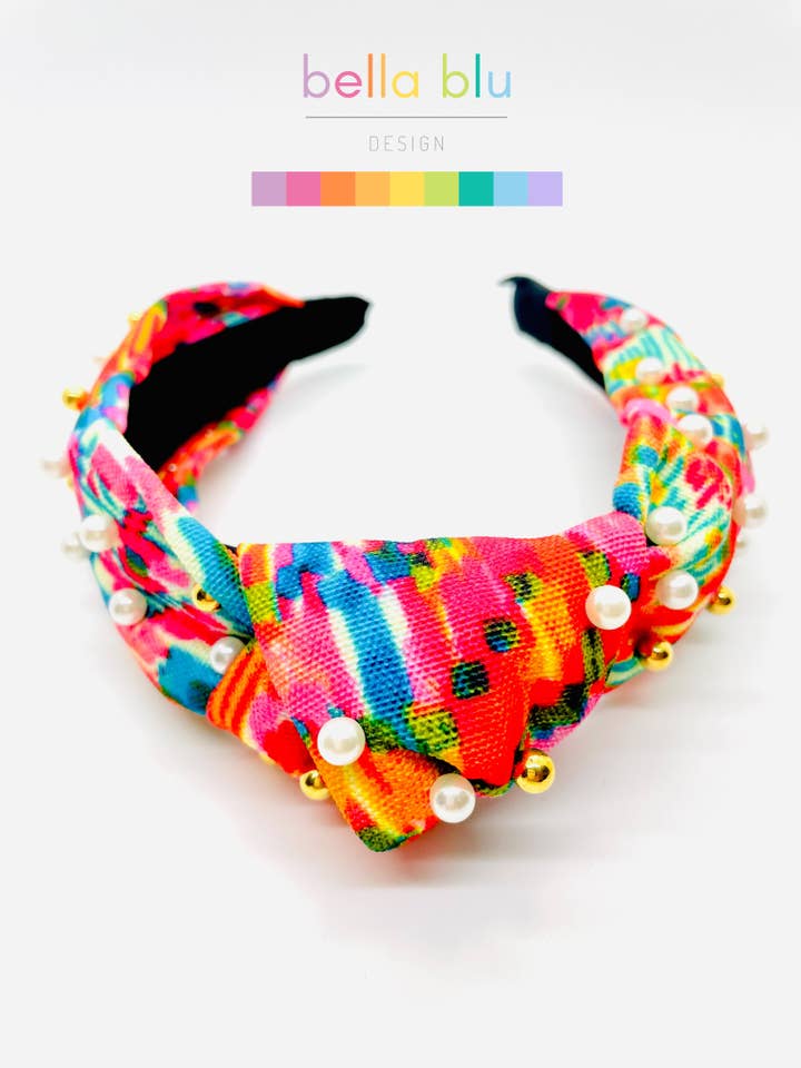 Oranje en parelkleurige hoofdband met abstracte print voor wholesale door Bella Blu Designs