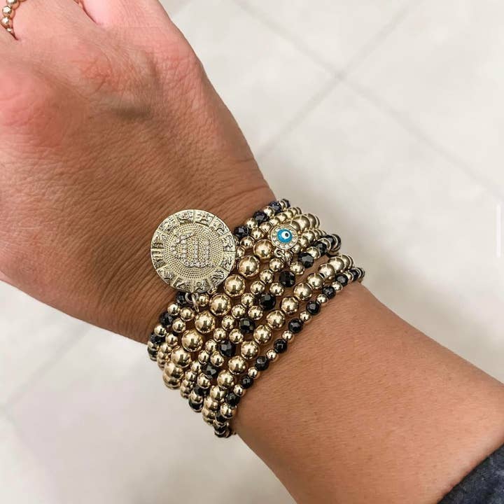 Bella Signature 4-mm-Goldperlenarmband mit Sternzeichen-Anhänger für den Großhandel von Bella Rose & Co