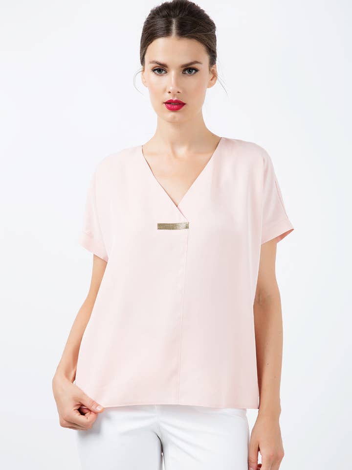 Kortärmad topp med V-ringad detalj för wholesale av conquista