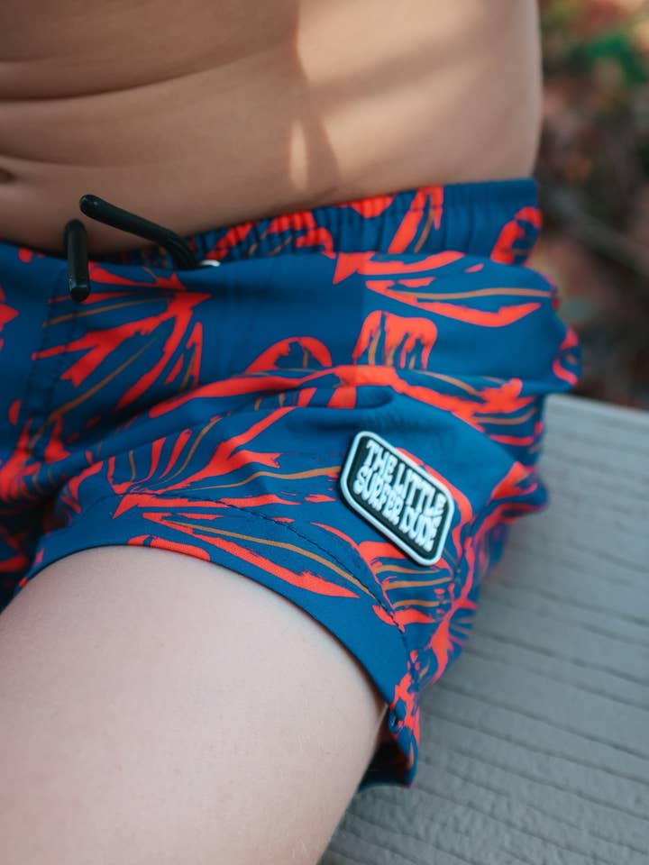 The Little Surfer Dude - Wholesale Swim Shorts - Kids - Dark Blue + Red Flower Swim Trunks