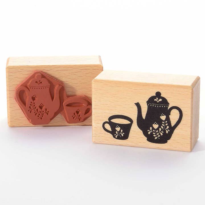 Motivstämpeltitel: Kaffekanna och kopp för kaffeskvaller för wholesale av Heindesign