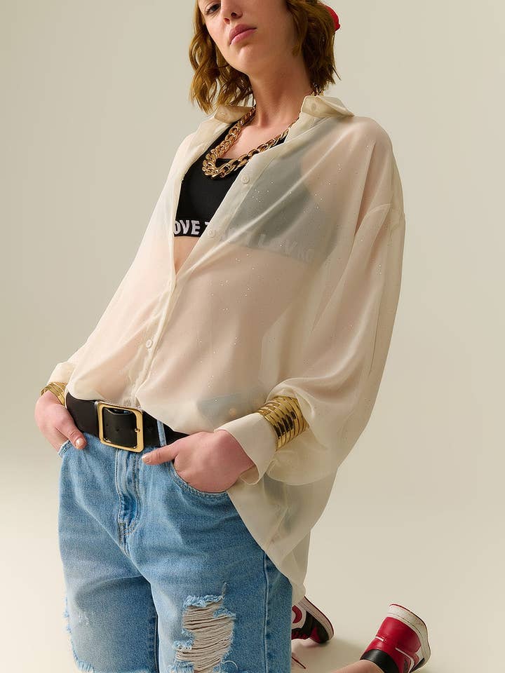 Soft beige chiffon blouse with glitter detail for wholesale by Q2—All Orders:Free Duties for the US,UK,and Canada