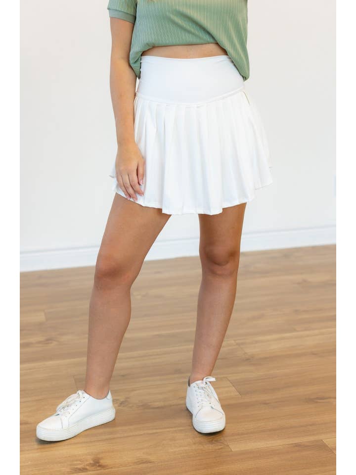 Blanc Jupe-culotte plissée blanche avec poche en vente sur Faire5