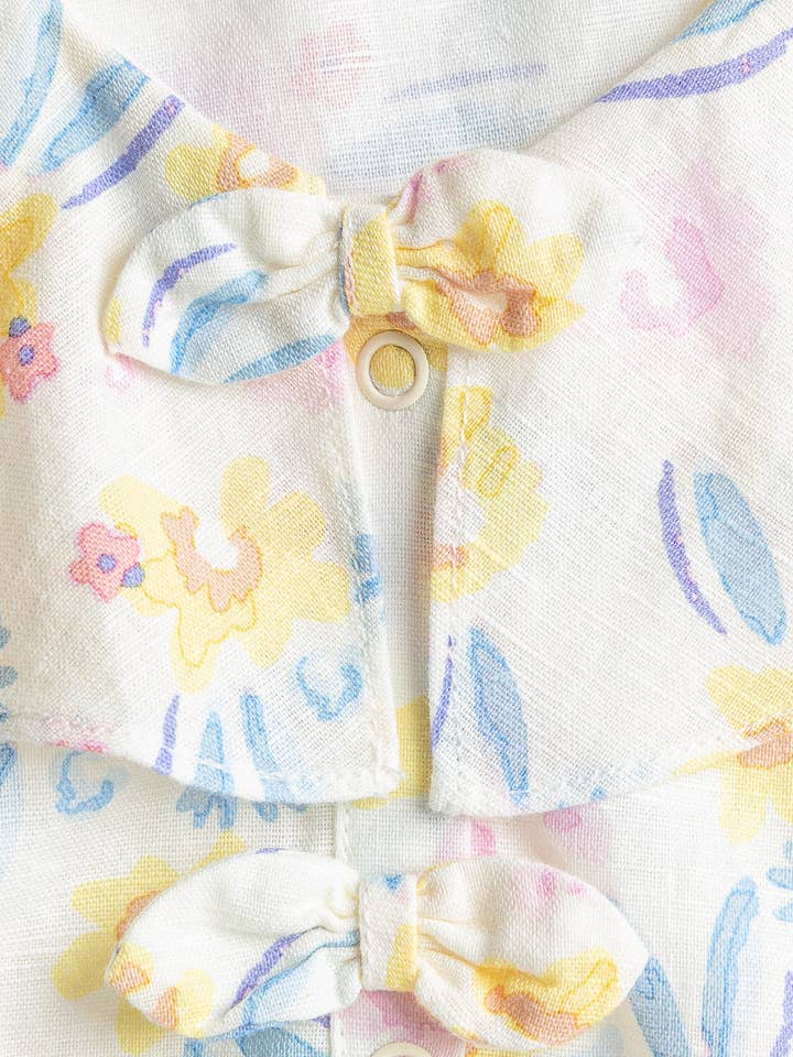 Spring Floral Serendipity Top for wholesale on Faire